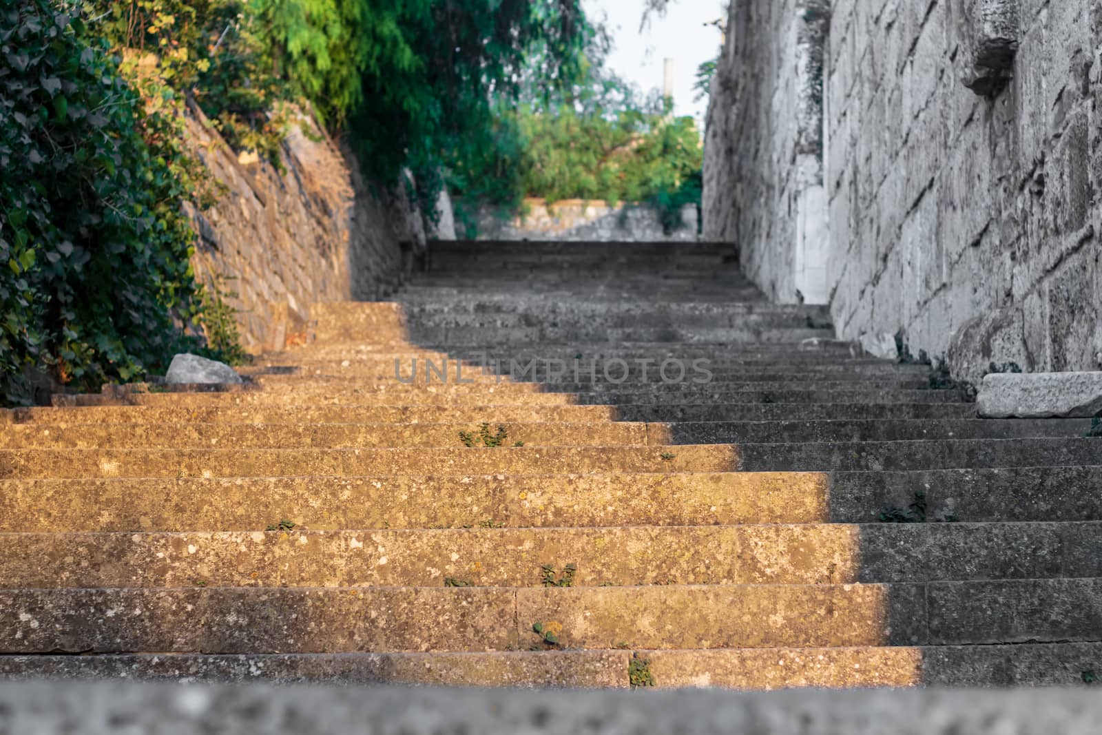 a very nice looking half colored half black and white stone stairs. photo has taken at izmir/turkey.
