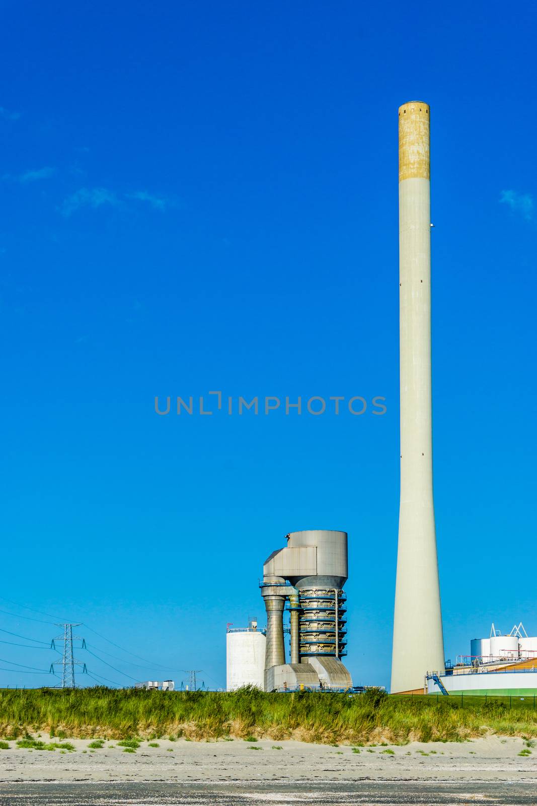 industry factory at the beach landscape by charlottebleijenberg