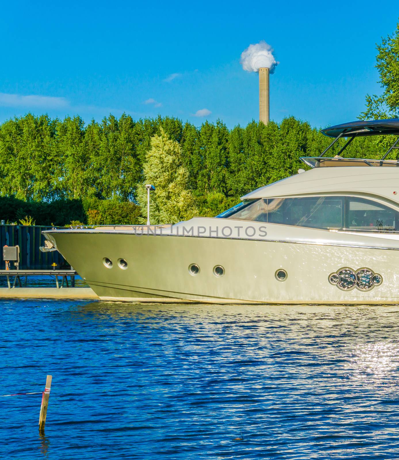 luxurious yacht boat on the water in a lake landscape