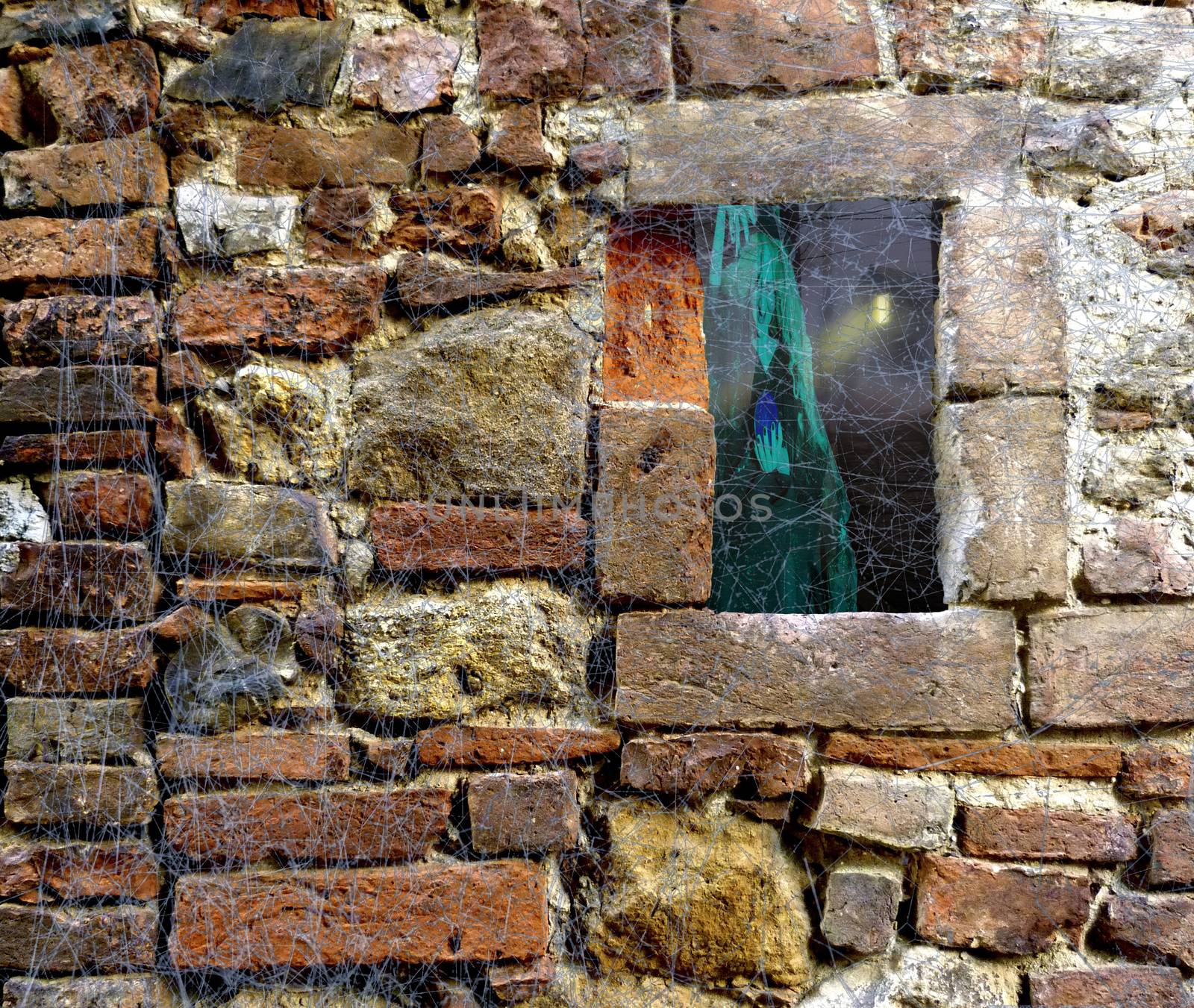 Halloween stone brick wall covered in spider web rags with a window looking on a scary horror forest with cabin and ghost witch by charlottebleijenberg