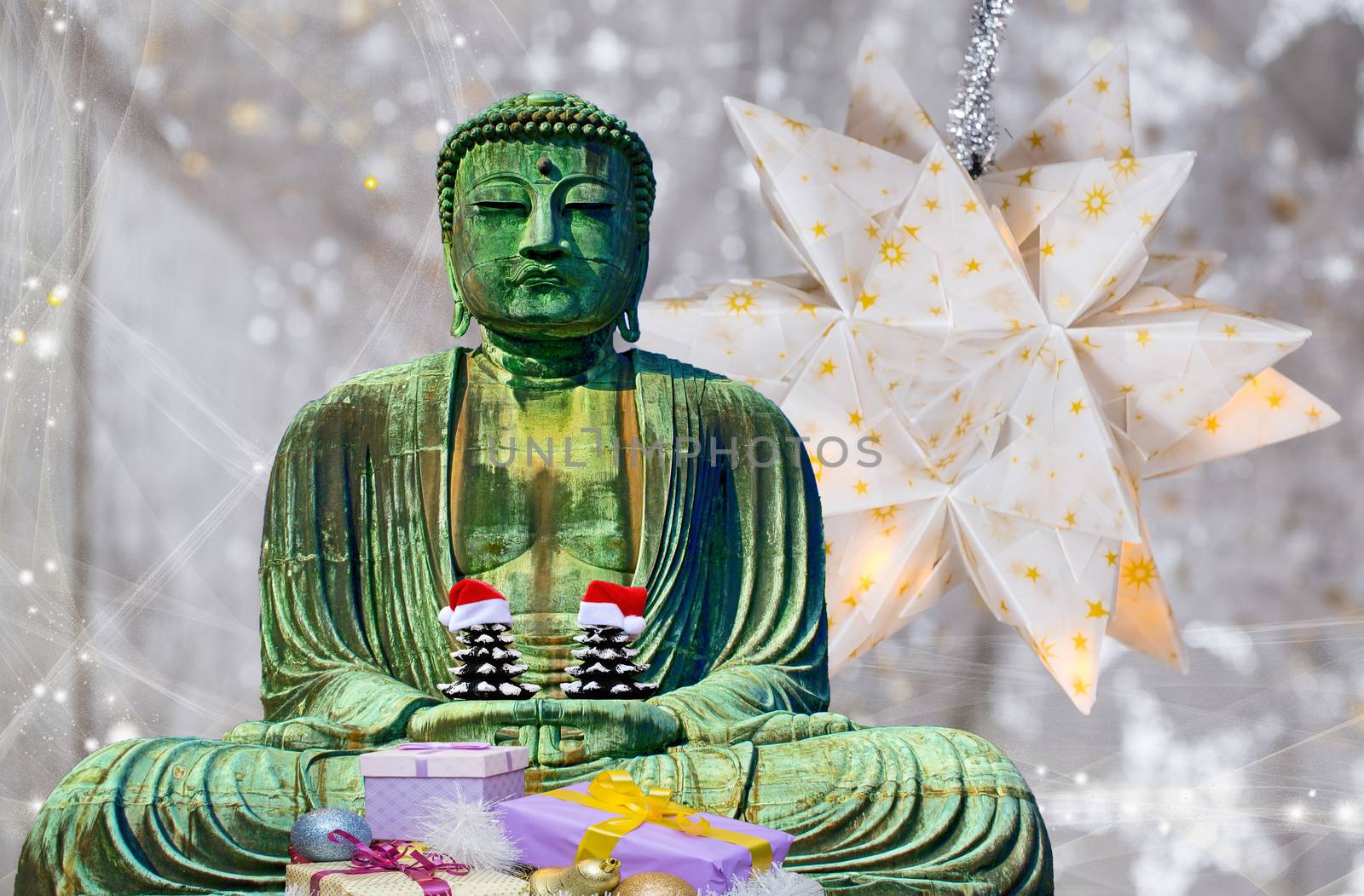 Christmas card buddha monk statue holding 2 christmas trees with hats and star background