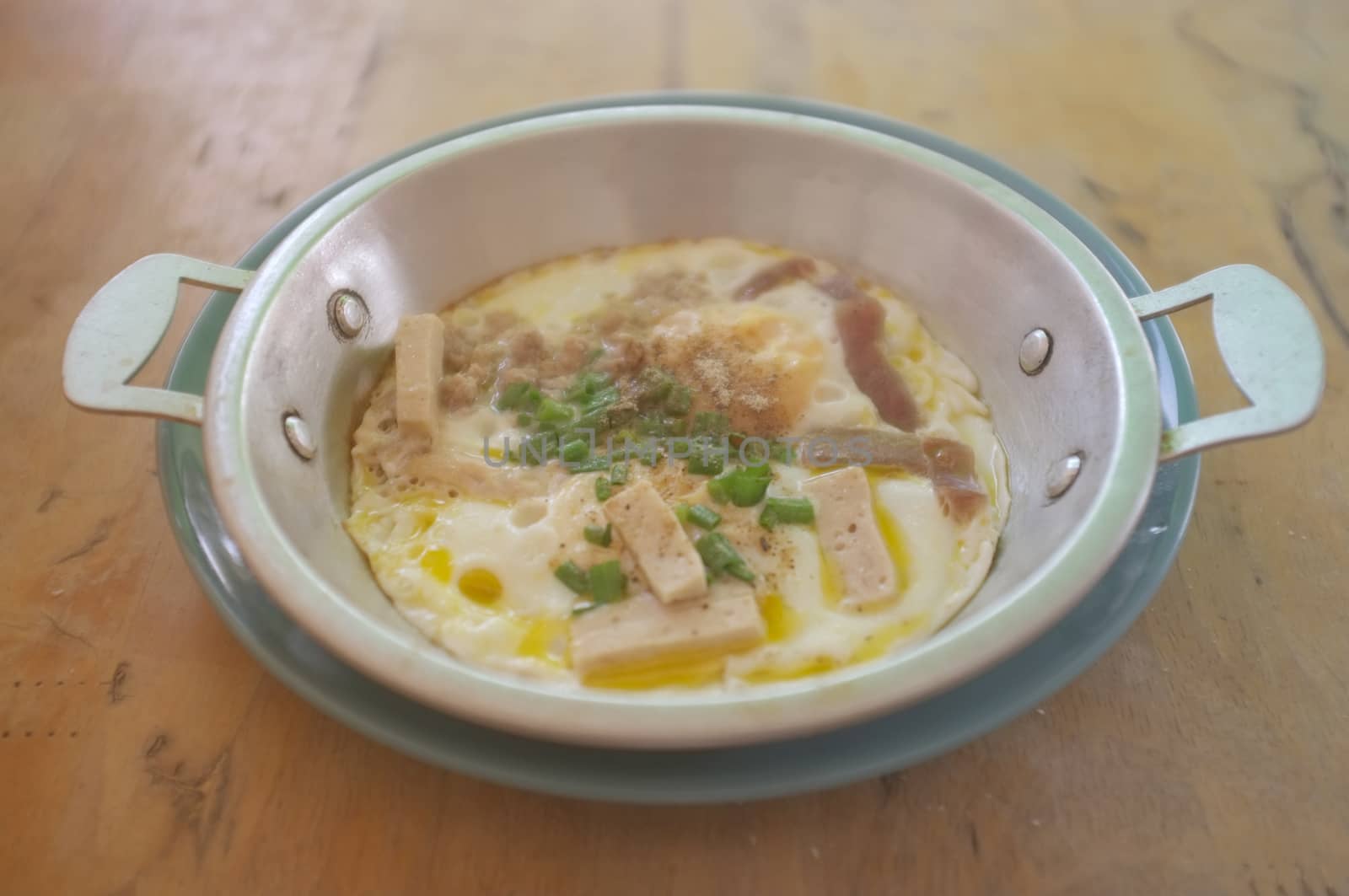 A world renowned delicacy from Sakon Nakhon , Thailand , Indochina pan-fried egg French bread