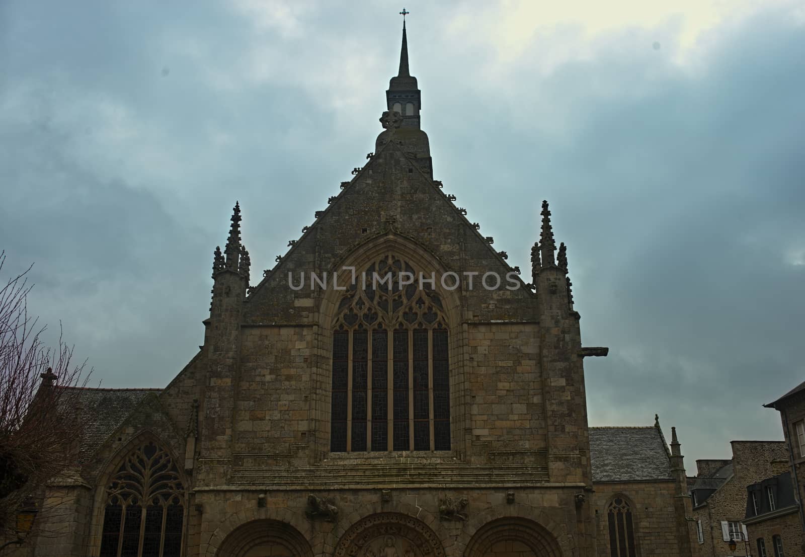 Huge old medieval stone catholic church in Dinan, France by sheriffkule