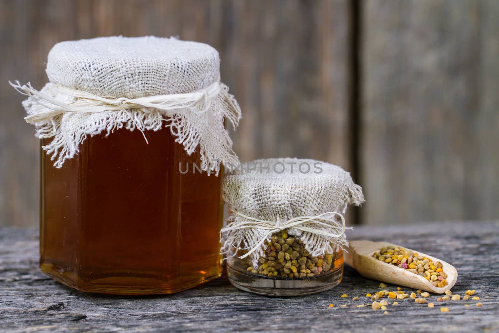 Fresh honey and bee pollen. Still life with honey