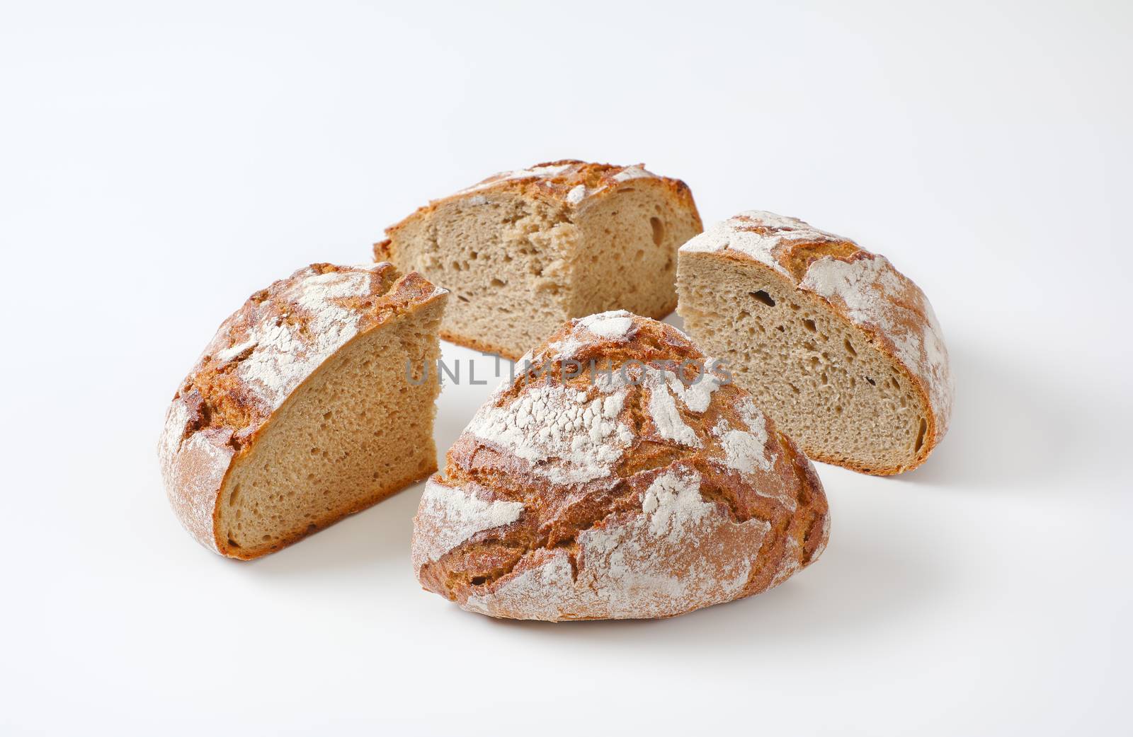 Rustic sourdough bread with crispy crust by Digifoodstock