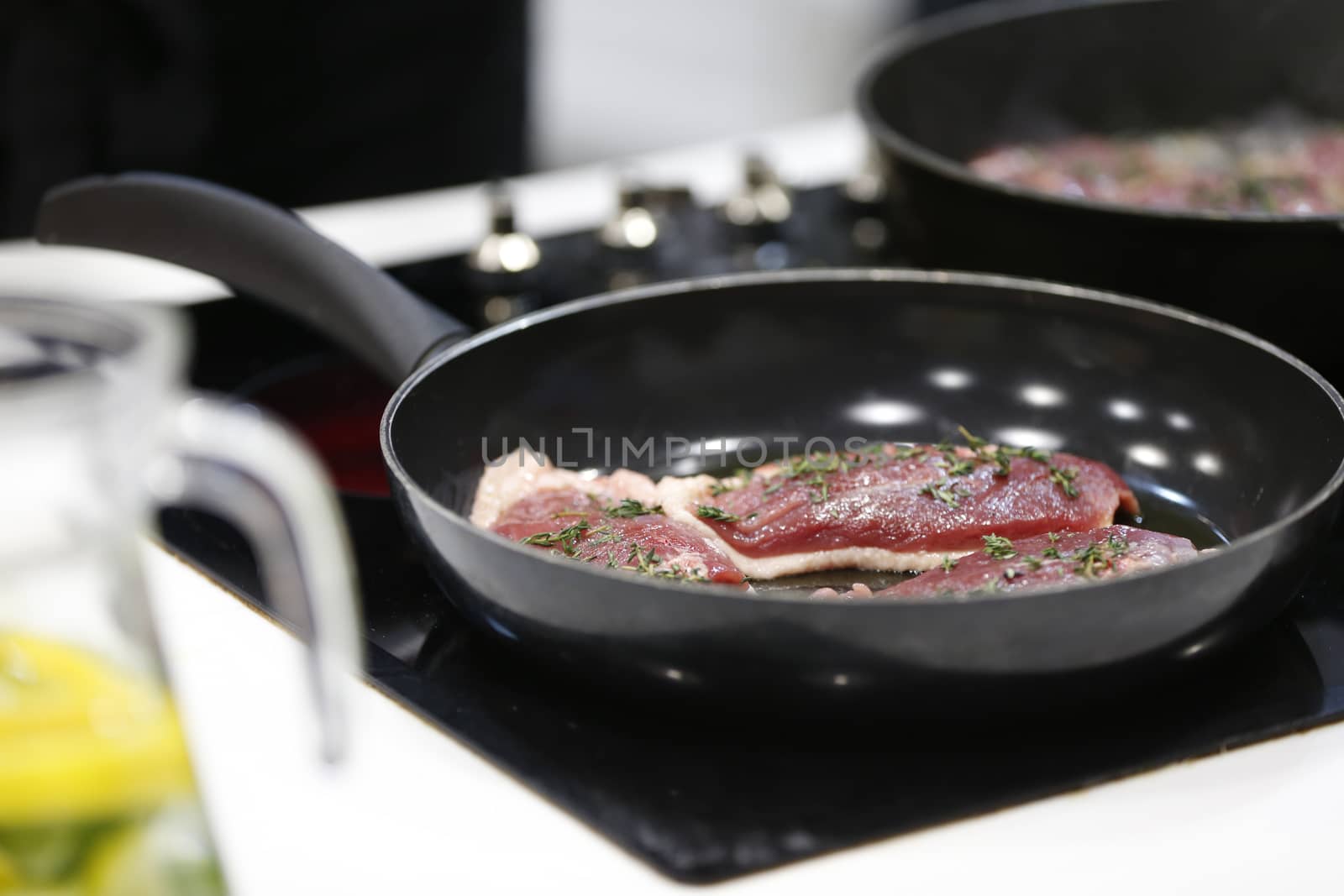 Fry meat in a frying pan.Fry the duck. Preparation of meat dishes.