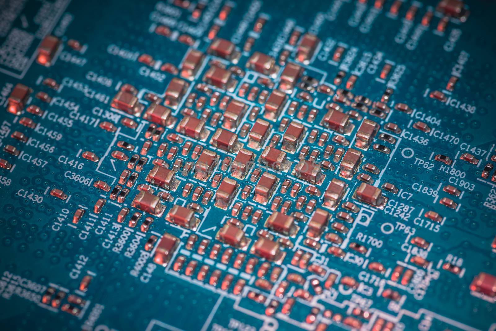 Close-up board with micro chips from an electrical appliance or computer. Concept of modern technology. Concept of electronics and microchips