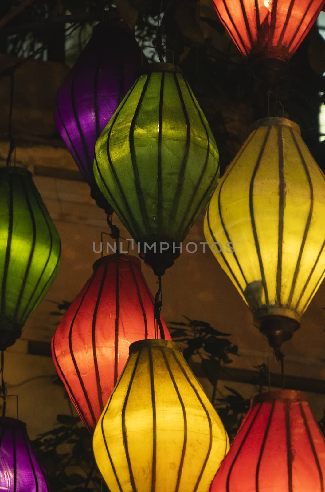 Beautiful decoration lanterns light on night market in Hoi An, Vietnam