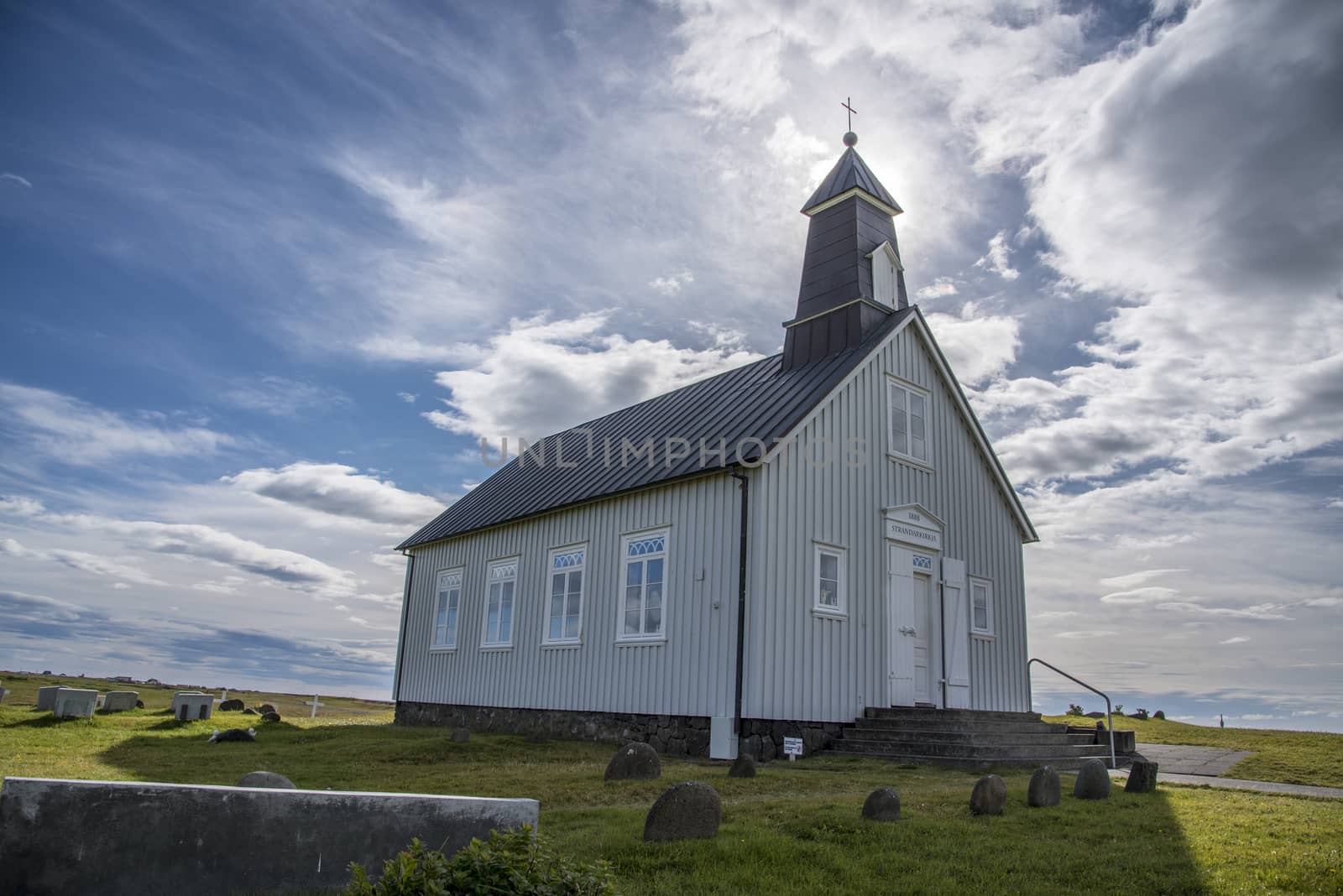 Strandarkirkja, Selvogur, Iceland. With White clouds and blue sky.