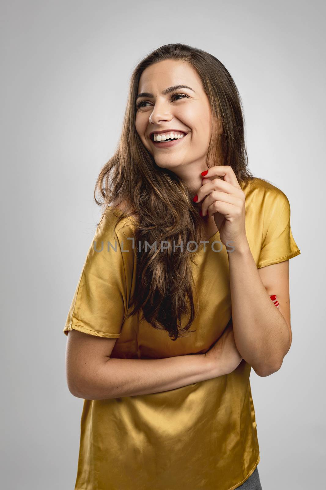 Beautiful brunete woman laughing by Iko