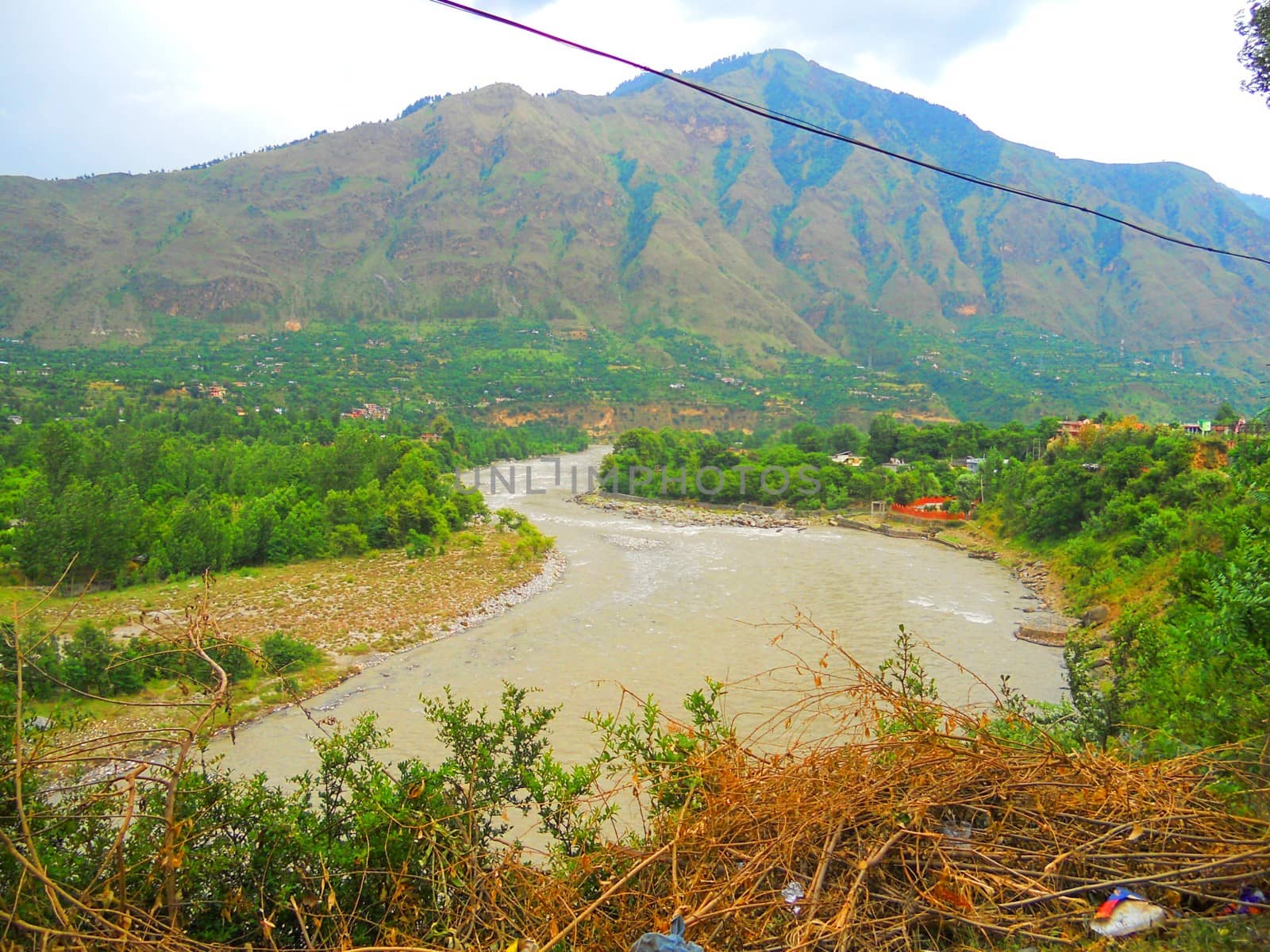 a view of a wayside green valley