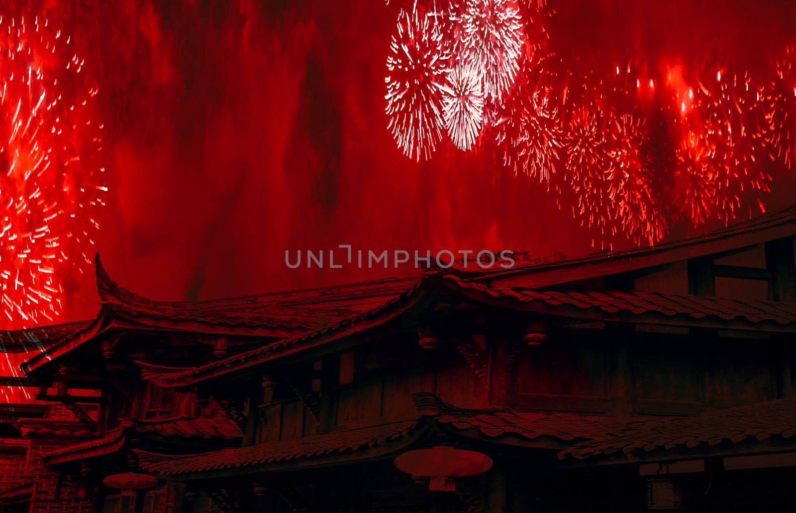China concept chinese new year celebration background with chinese rooftops and fireworks with red smoke