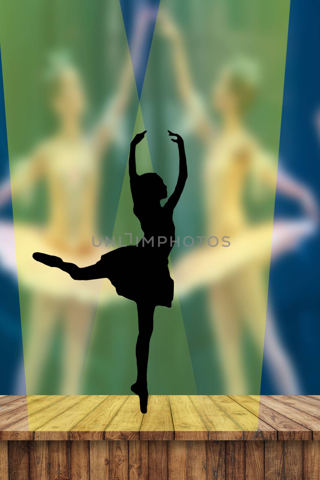Ballerina silhouette dancing on pointe on stage in the spotlight in attitude derriere postion with two ballerinas on the background by charlottebleijenberg