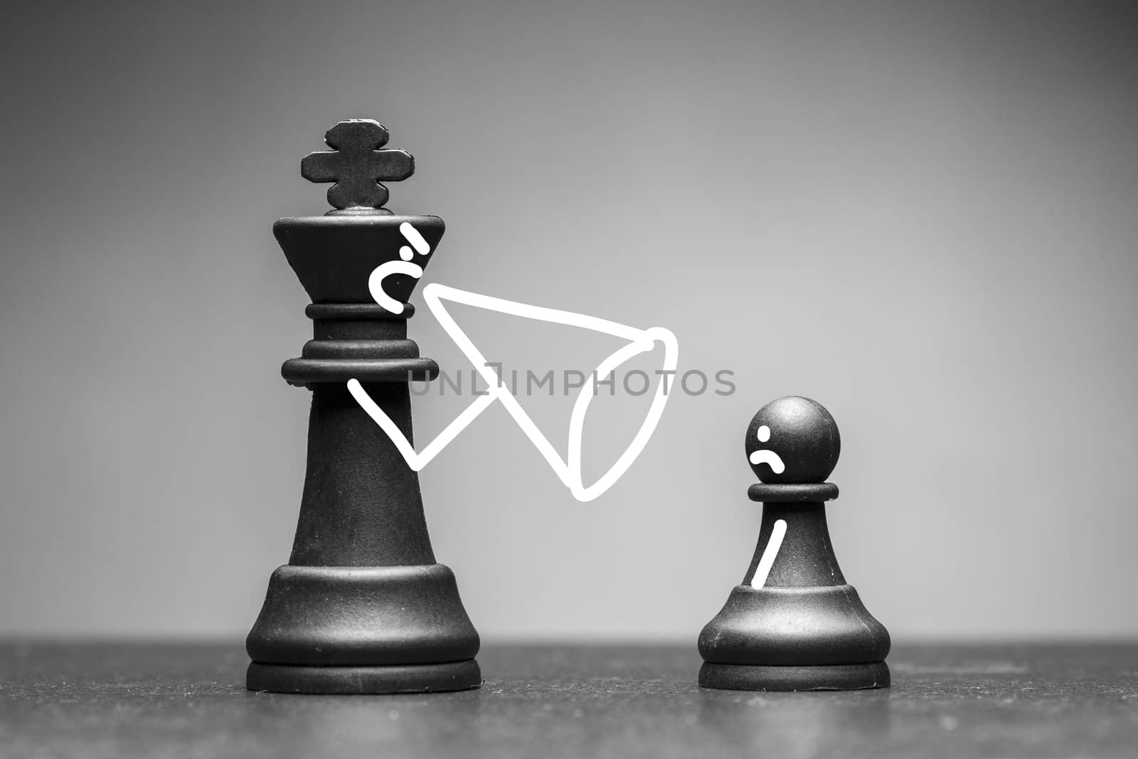 King chess piece using a megaphone yelling at a pawn with a dejected expression in a conceptual greyscale illustration
