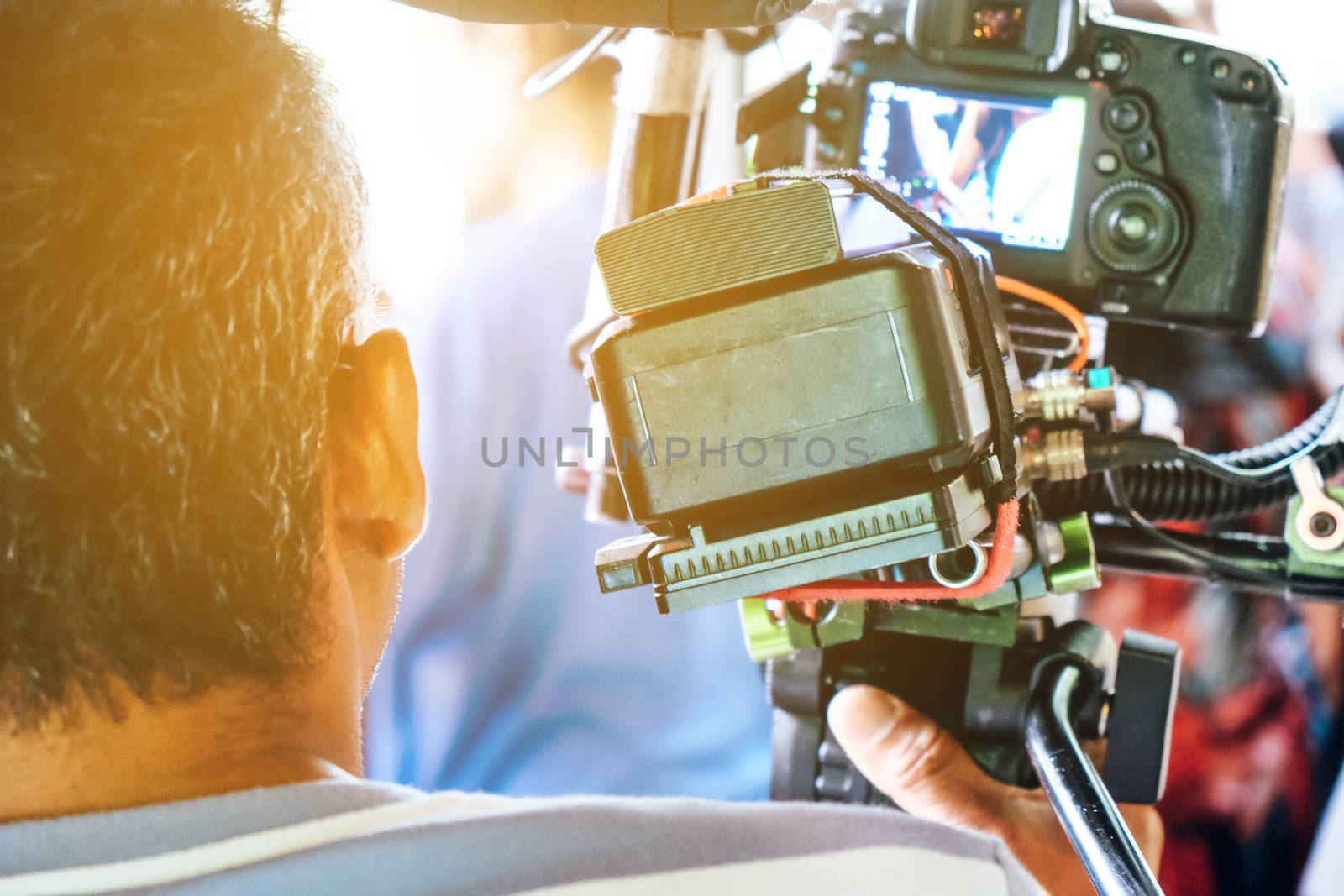 Film industry. Filming with professional camera background