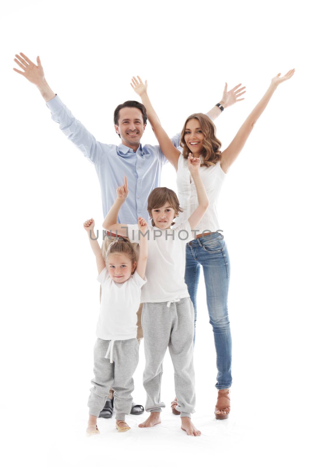 Happy smiling family of parents and two children with raised hands up isolated on white background