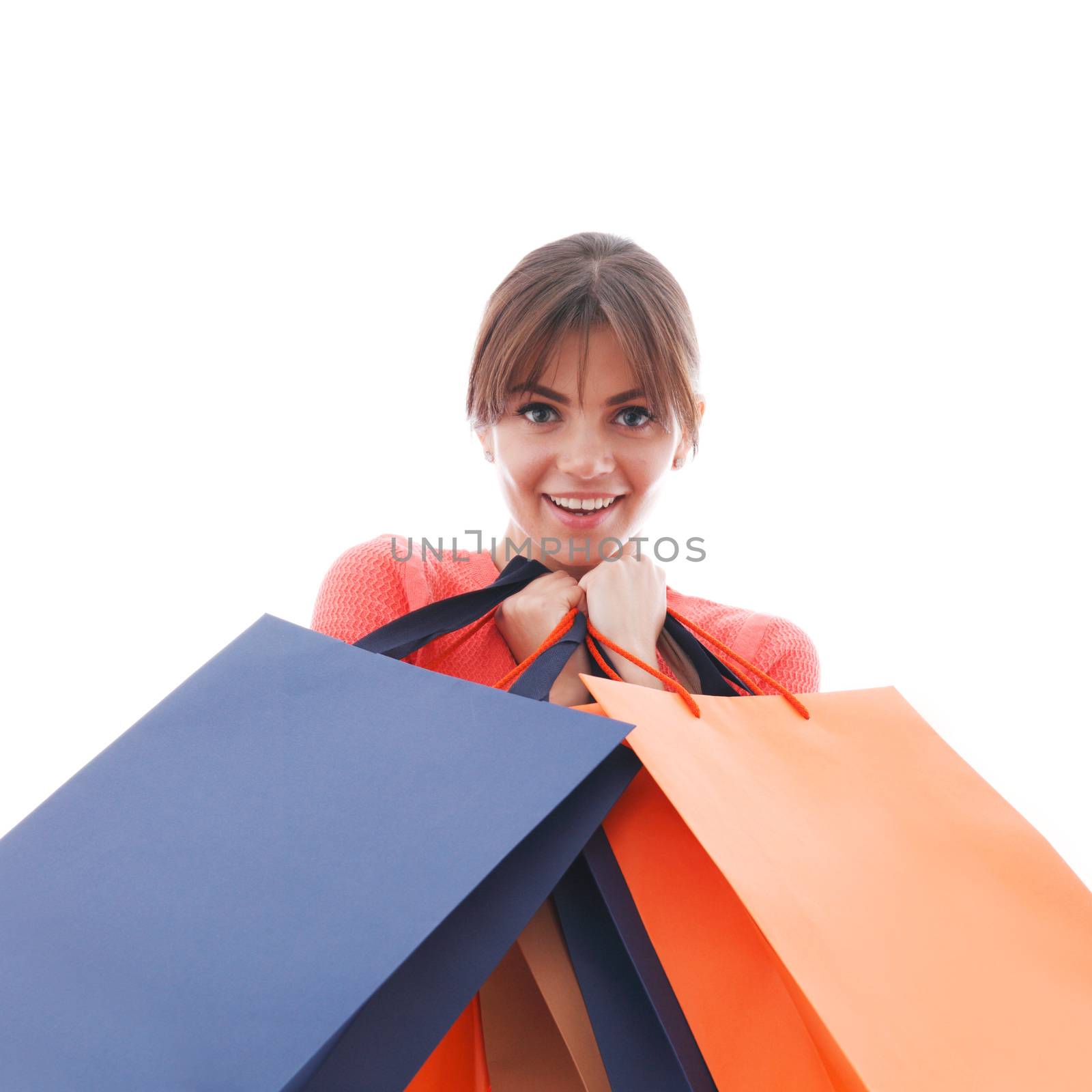 Shopping woman happy smiling holding shopping bags isolated on white background