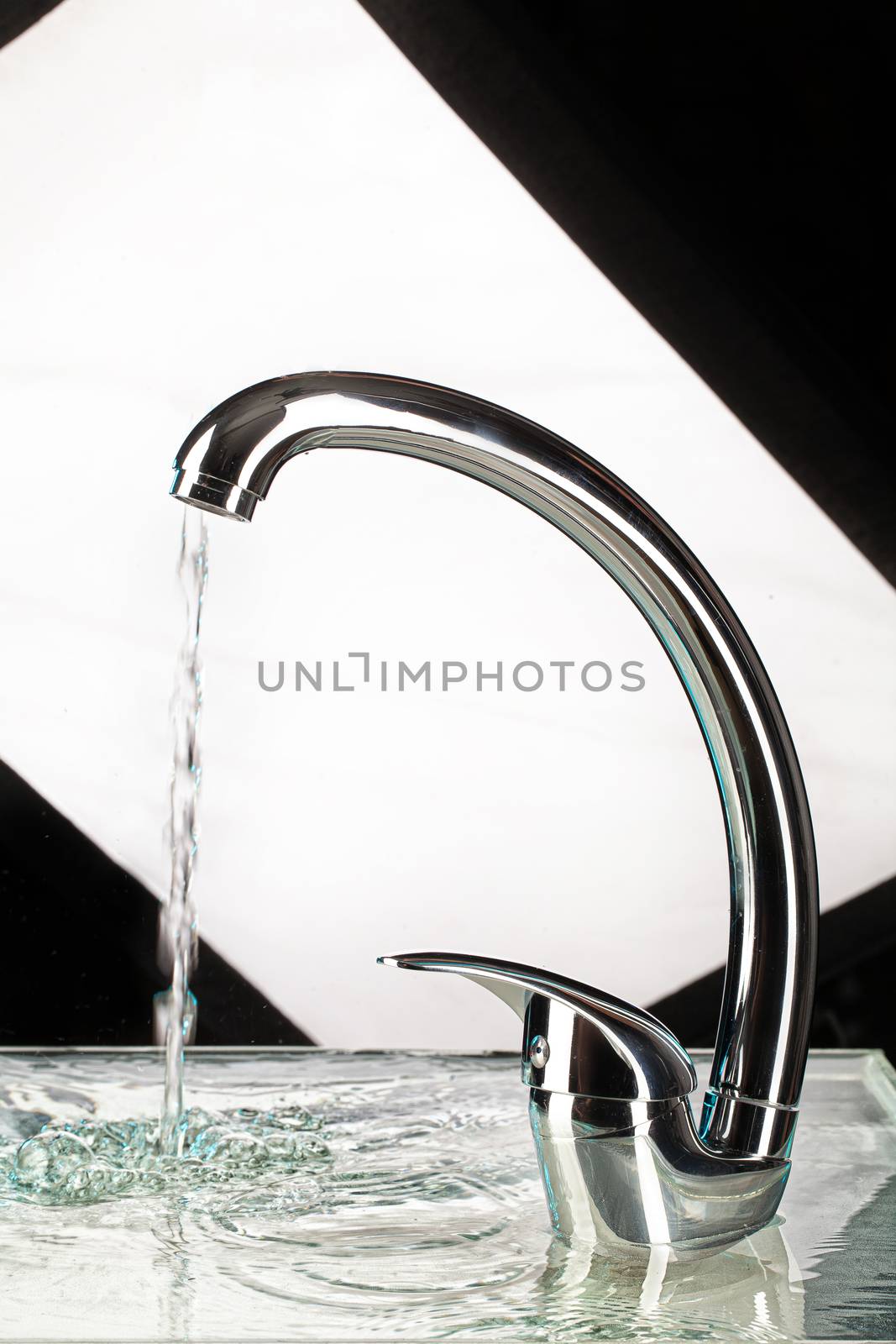 Water mixer and fruits on a studio background