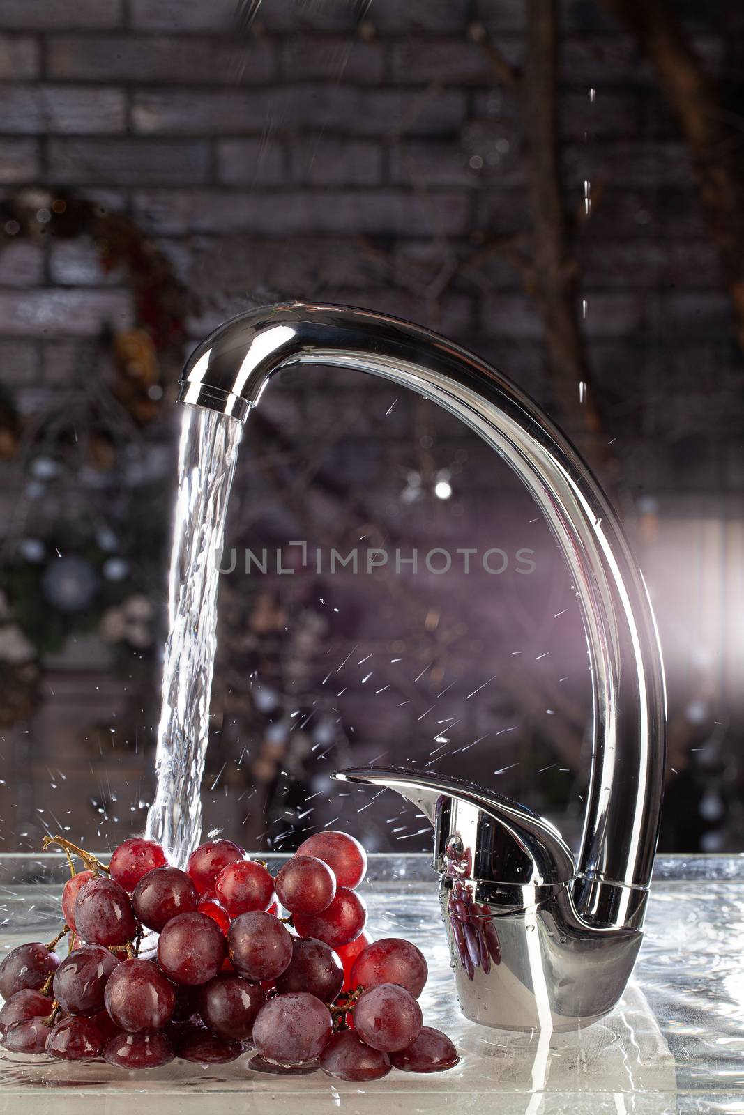 Water mixer and fruits on a studio background