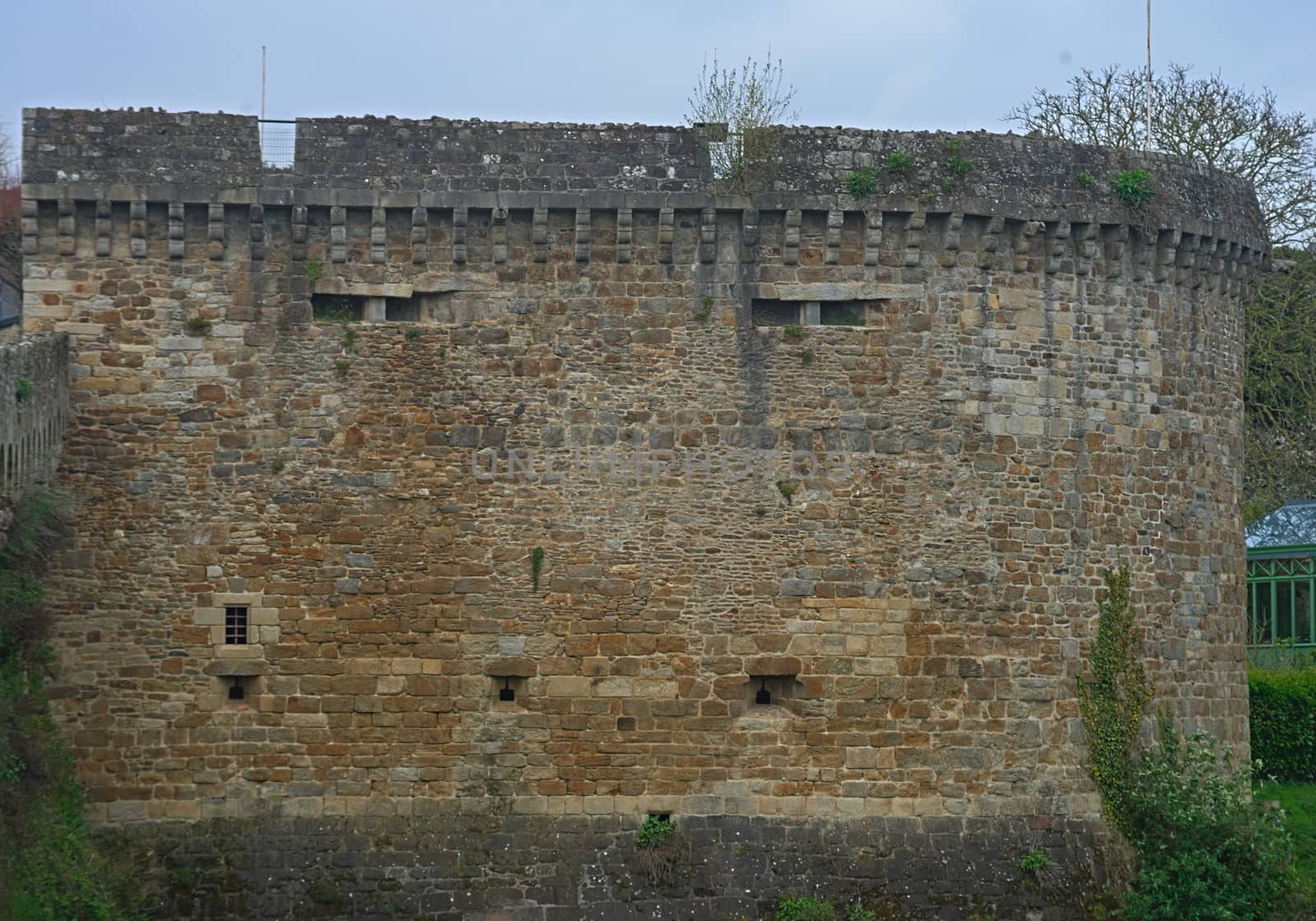 Close up view on big old stone tower at Dinan, France