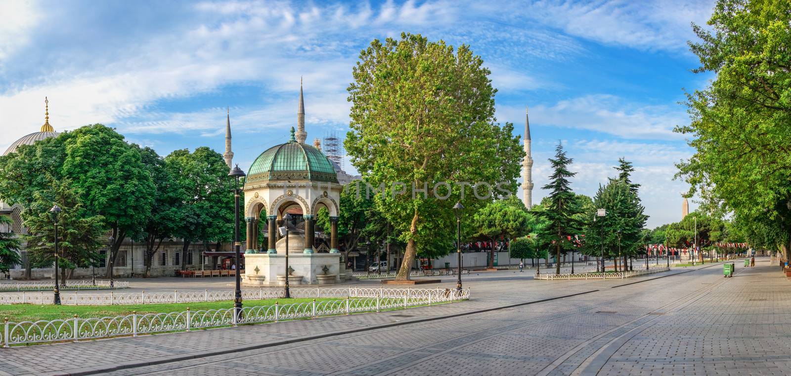 Istambul, Turkey – 07.13.2019. Many tourists walk around Sultan Ahmet Park on the site of a former Hippodrome in Istanbul, Turkey, on a sunny summer morning