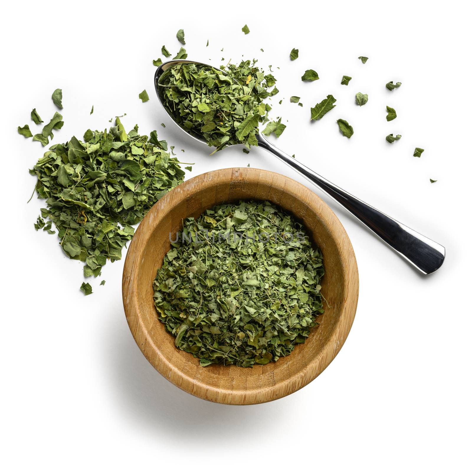 Dried Moringa on a white background. The view from the top.