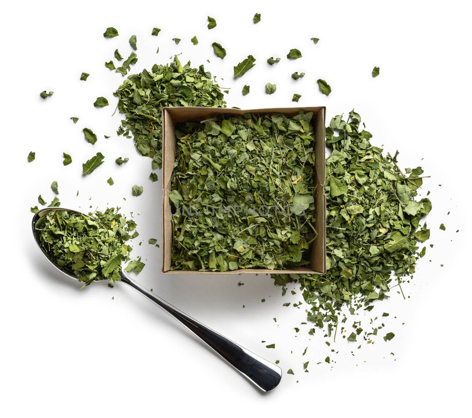Dried Moringa on a white background. The view from the top.