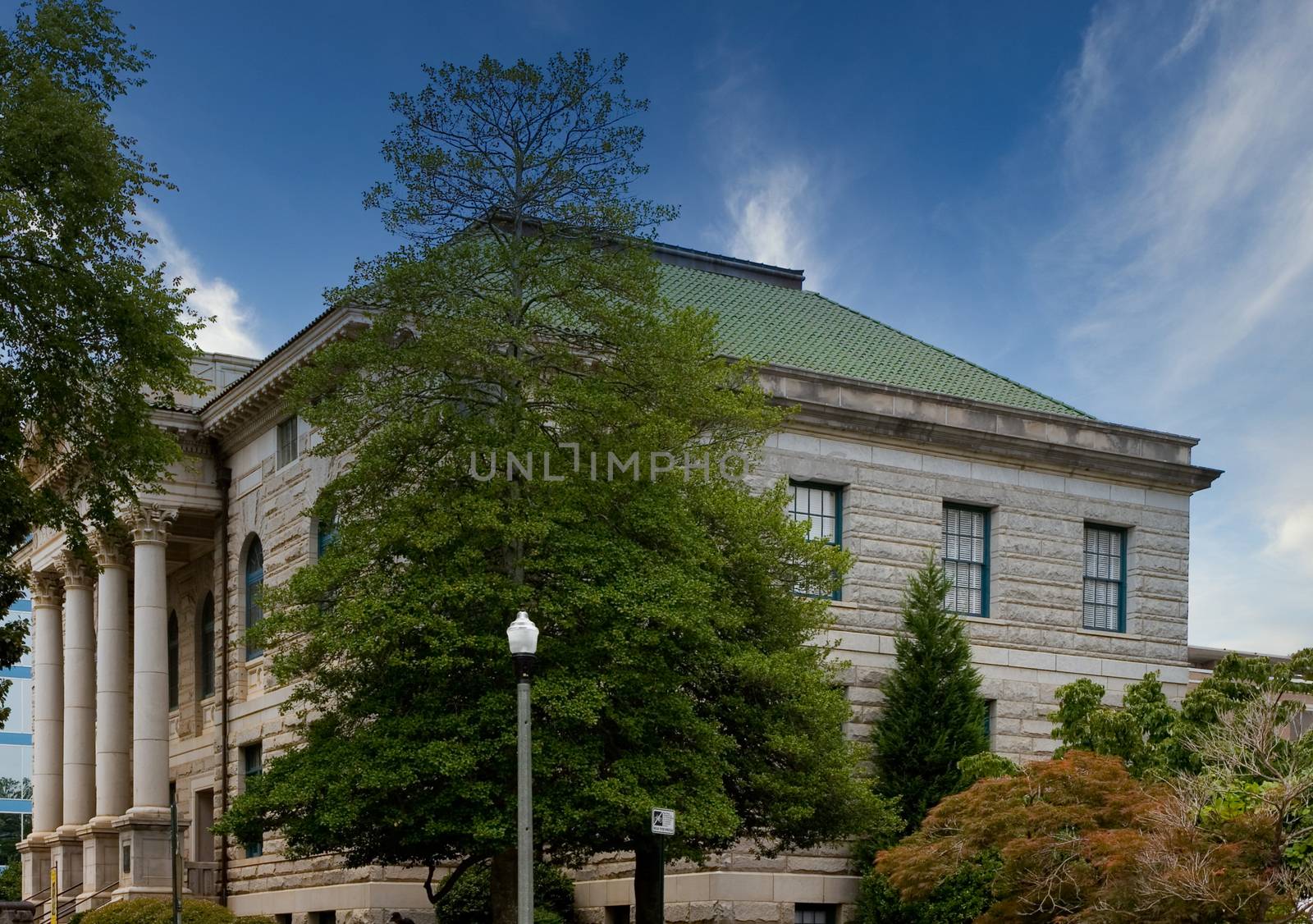 An old granite courthouse with columns