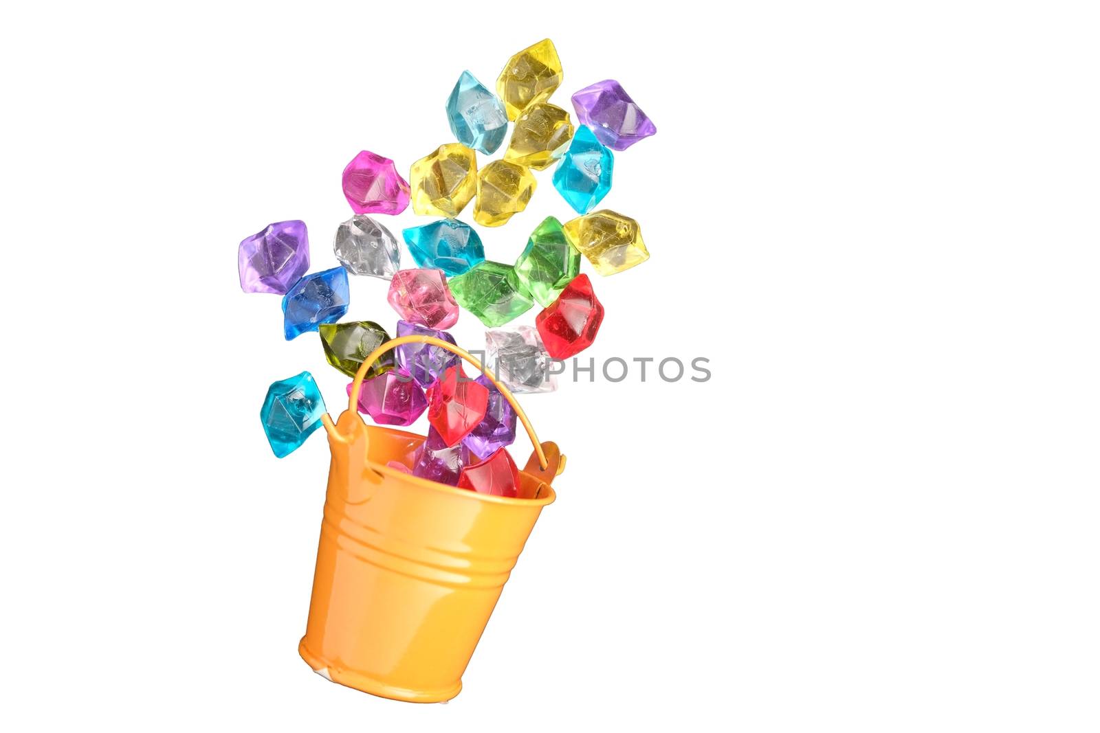 precious stones artificial color in bucket on white background