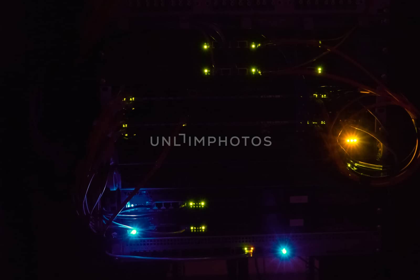 A working server. Internet wires and flashing lights on the server.