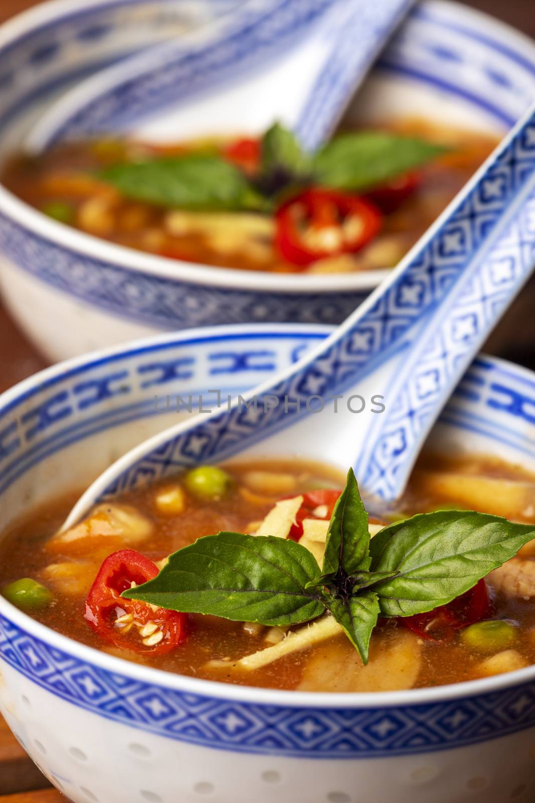 chinese sweet and sour soup on wood