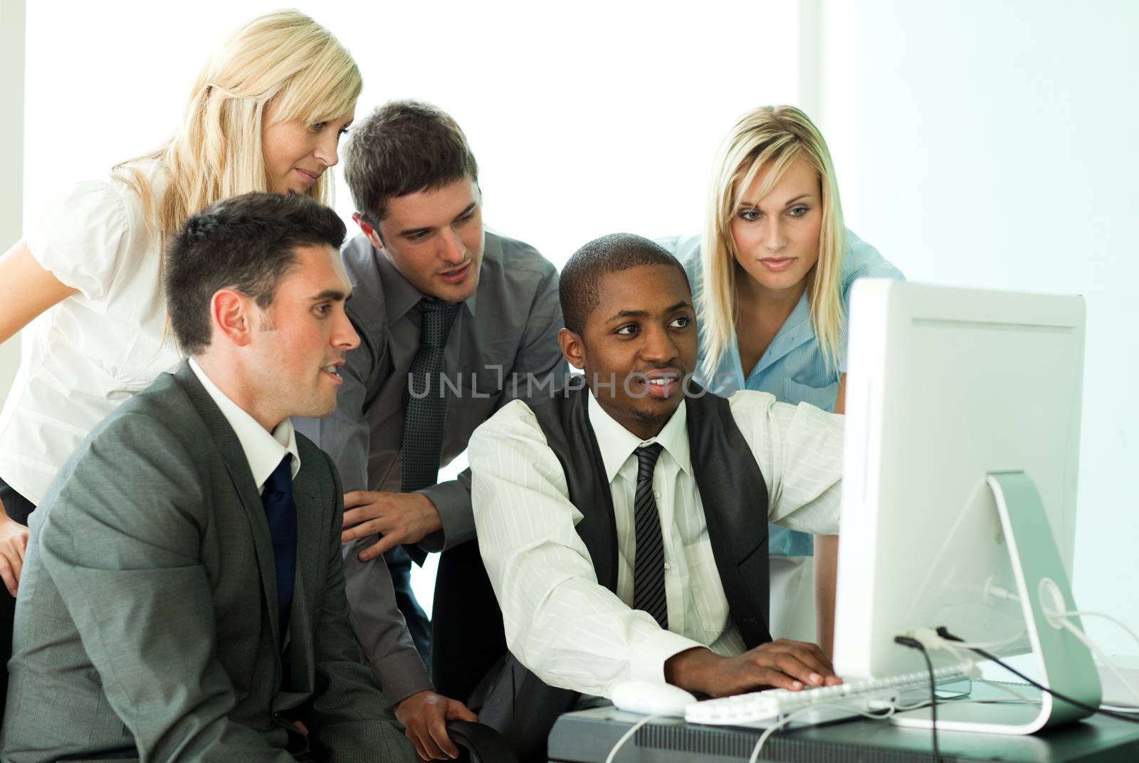Business team working in office together