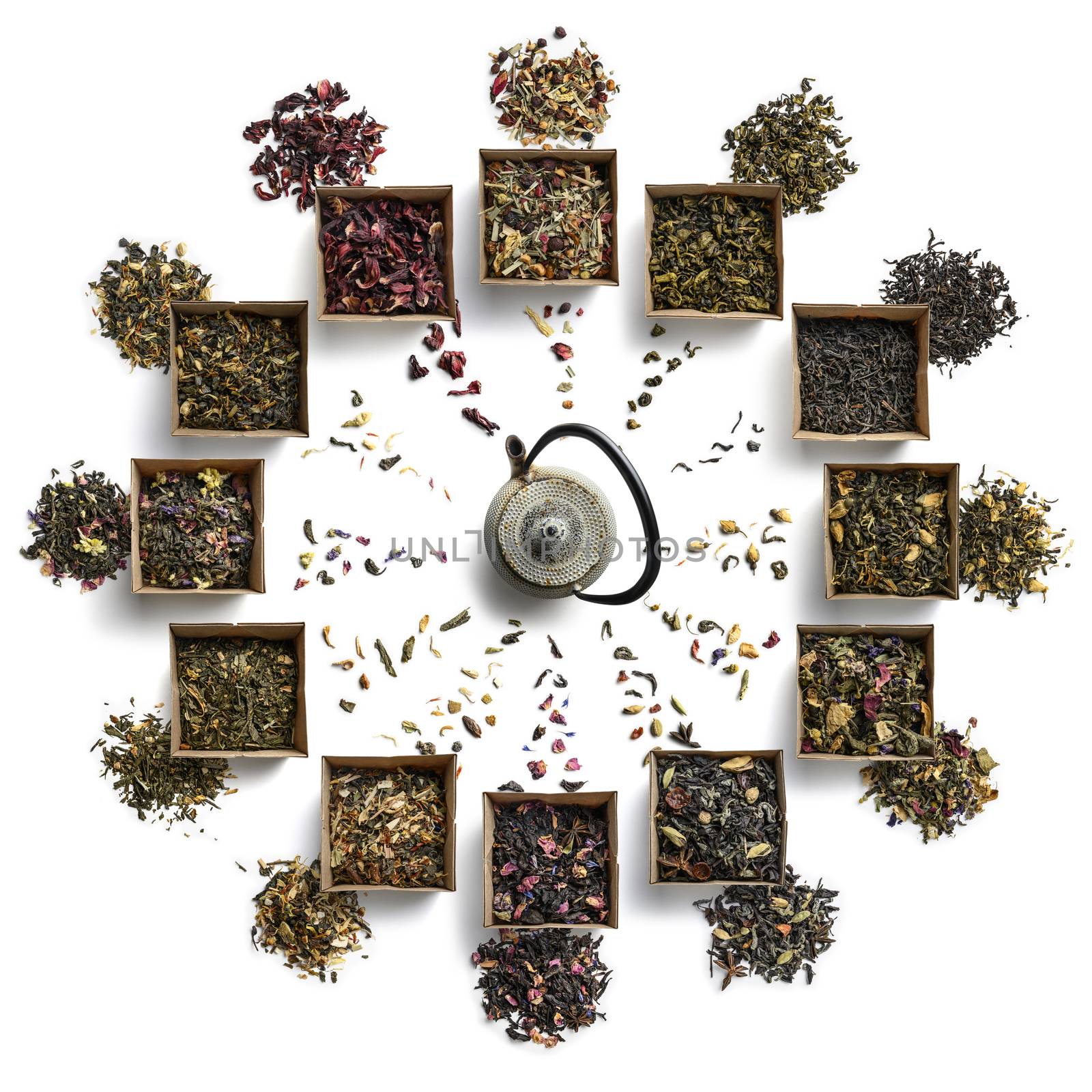 Large tea set in the shape of a clock face. Top view on white background.