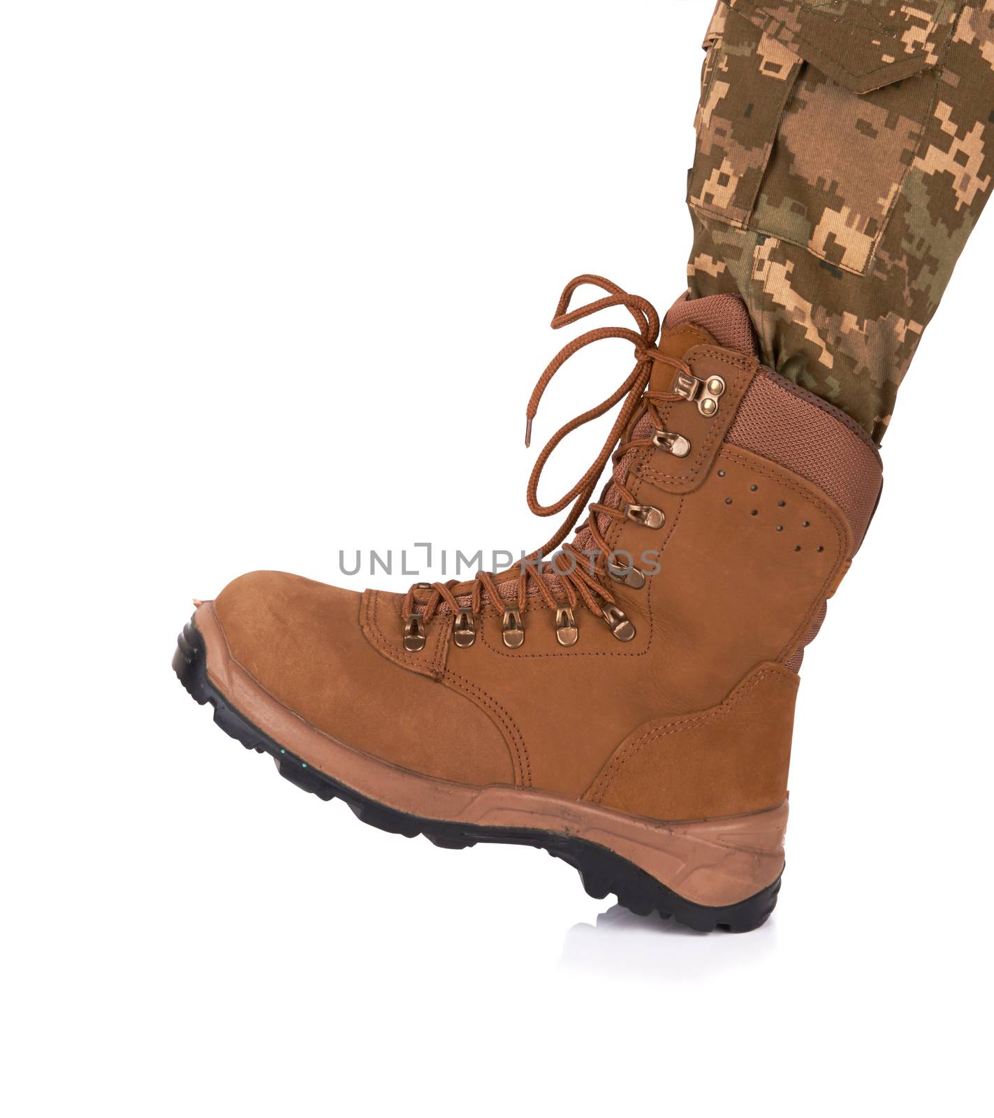 soldier leg in army boot isolated on white background