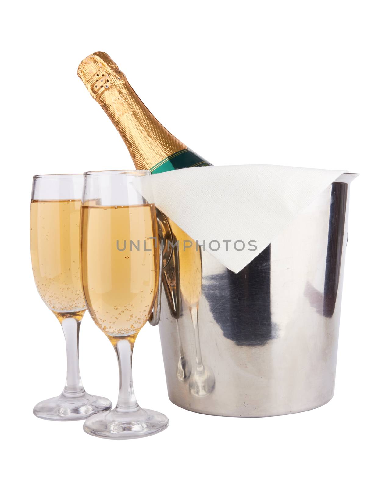 Champagne bottle in cooler and two champagne glasses 