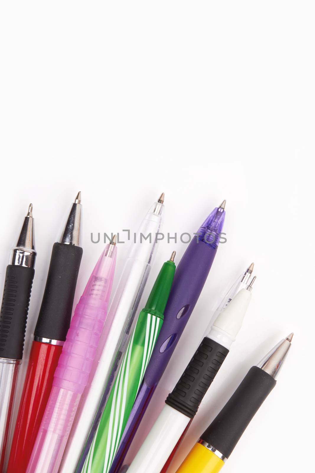 Different kinds of pens isolated on white background 