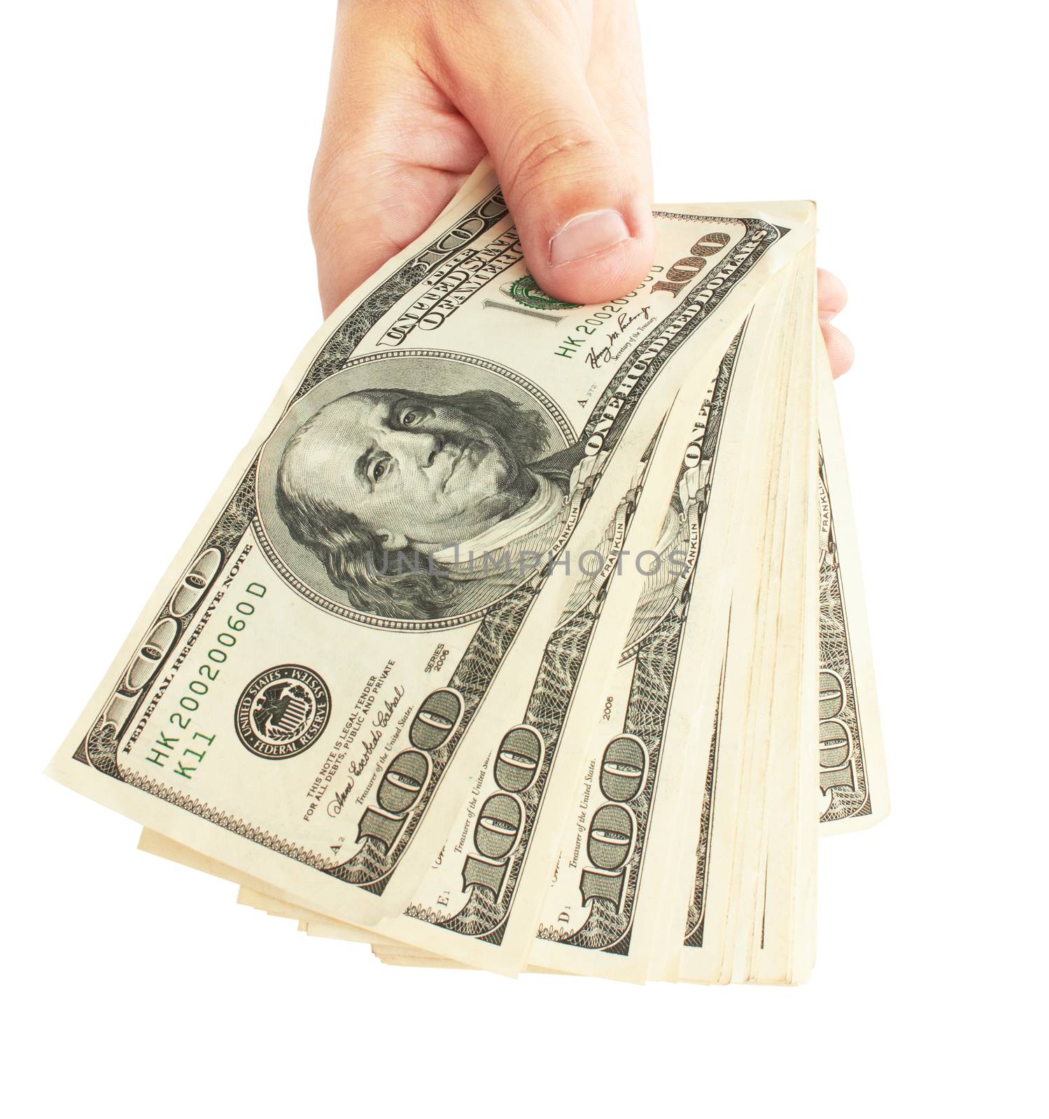 Male hand with stack of dollars isolated on white 