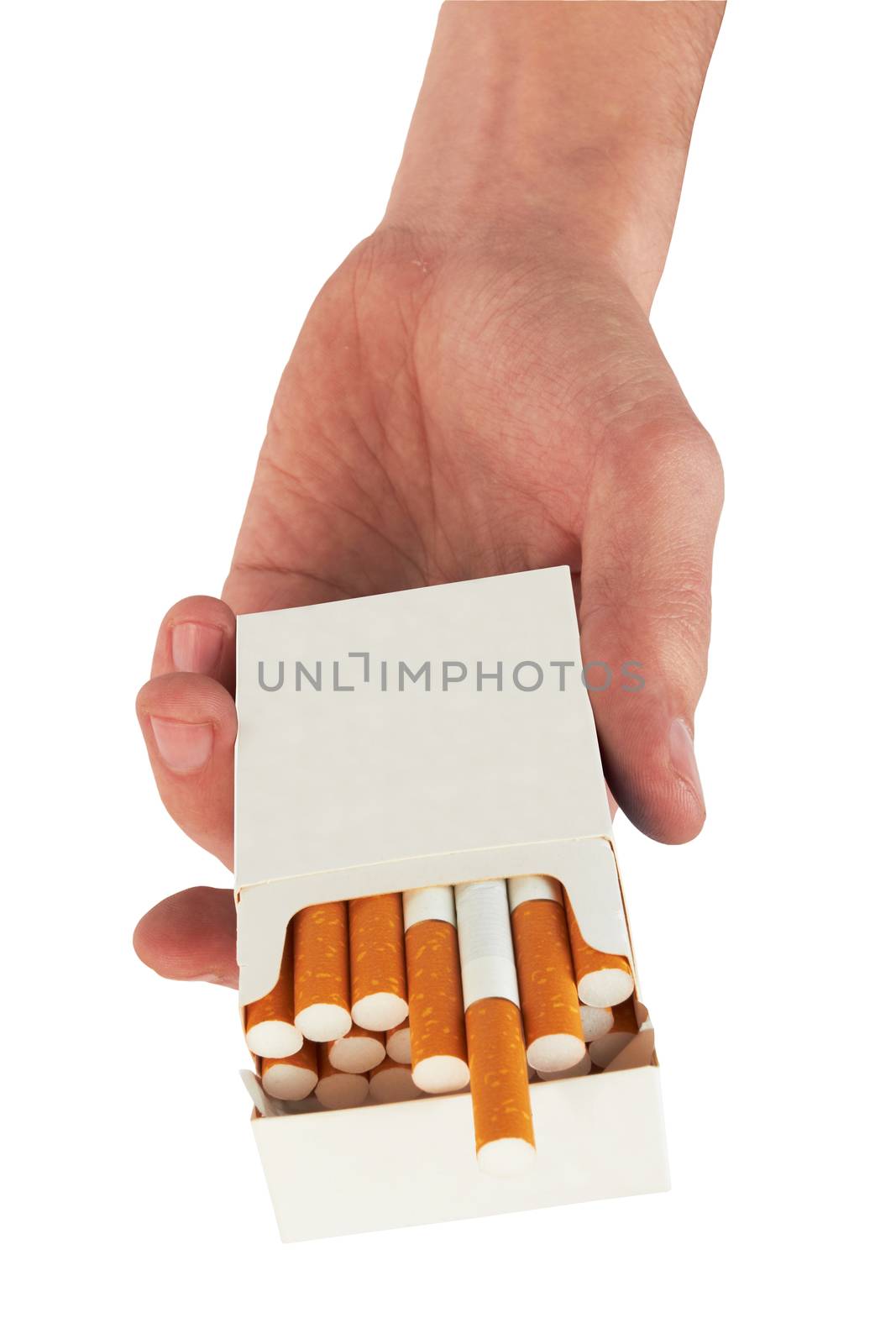 Pack of cigarettes in hand, isolated on white background 