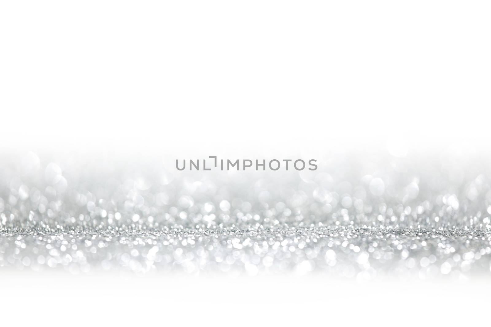 Holiday silver glitters isolated on white background