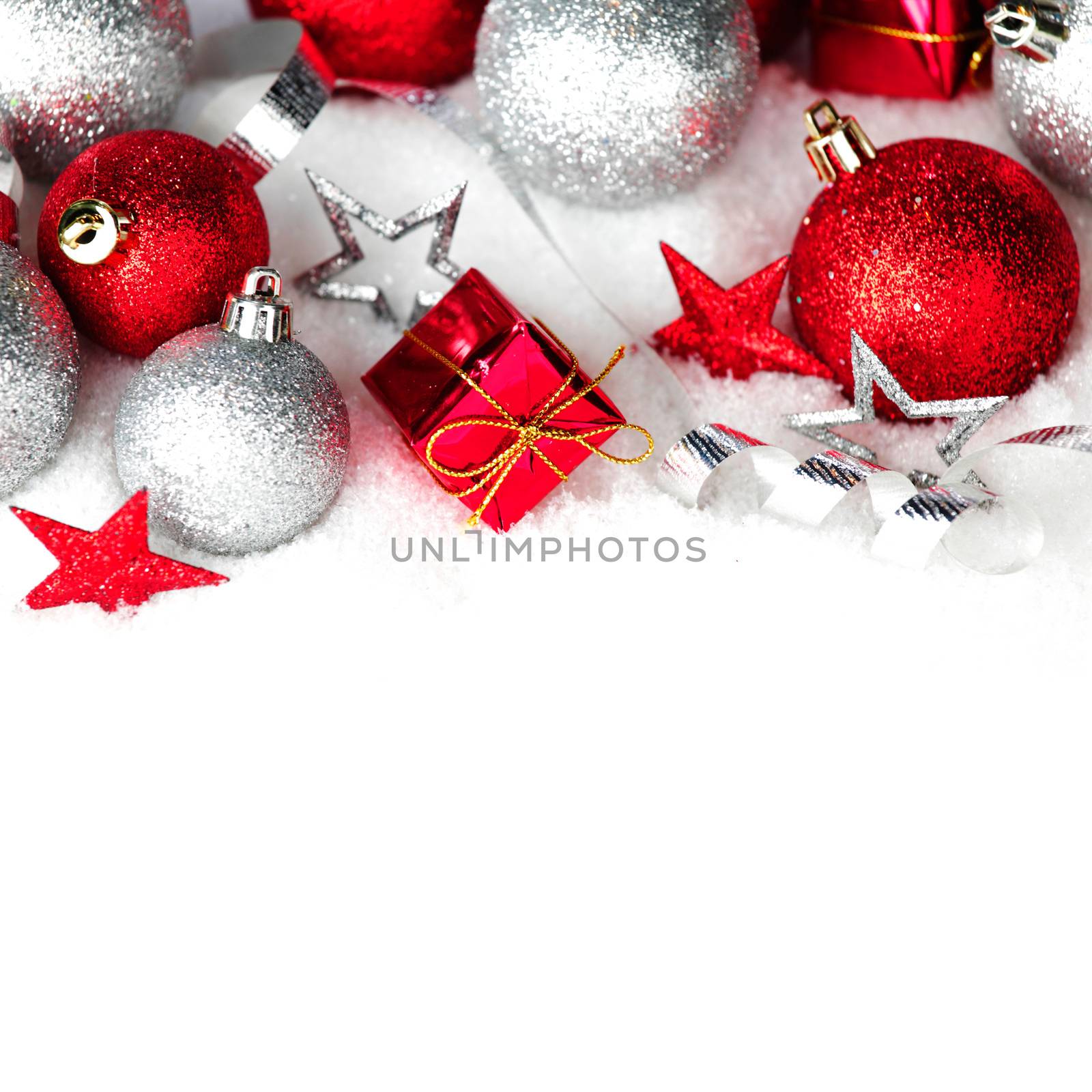 Beautiful various christmas decor on snow close-up