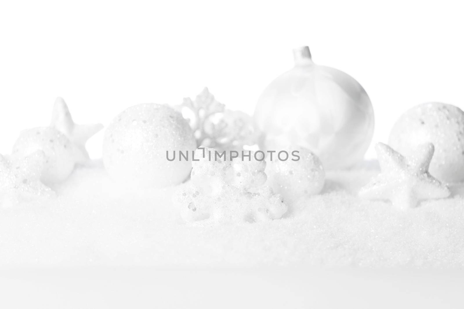 Christmas card with beautiful white decorations in snow