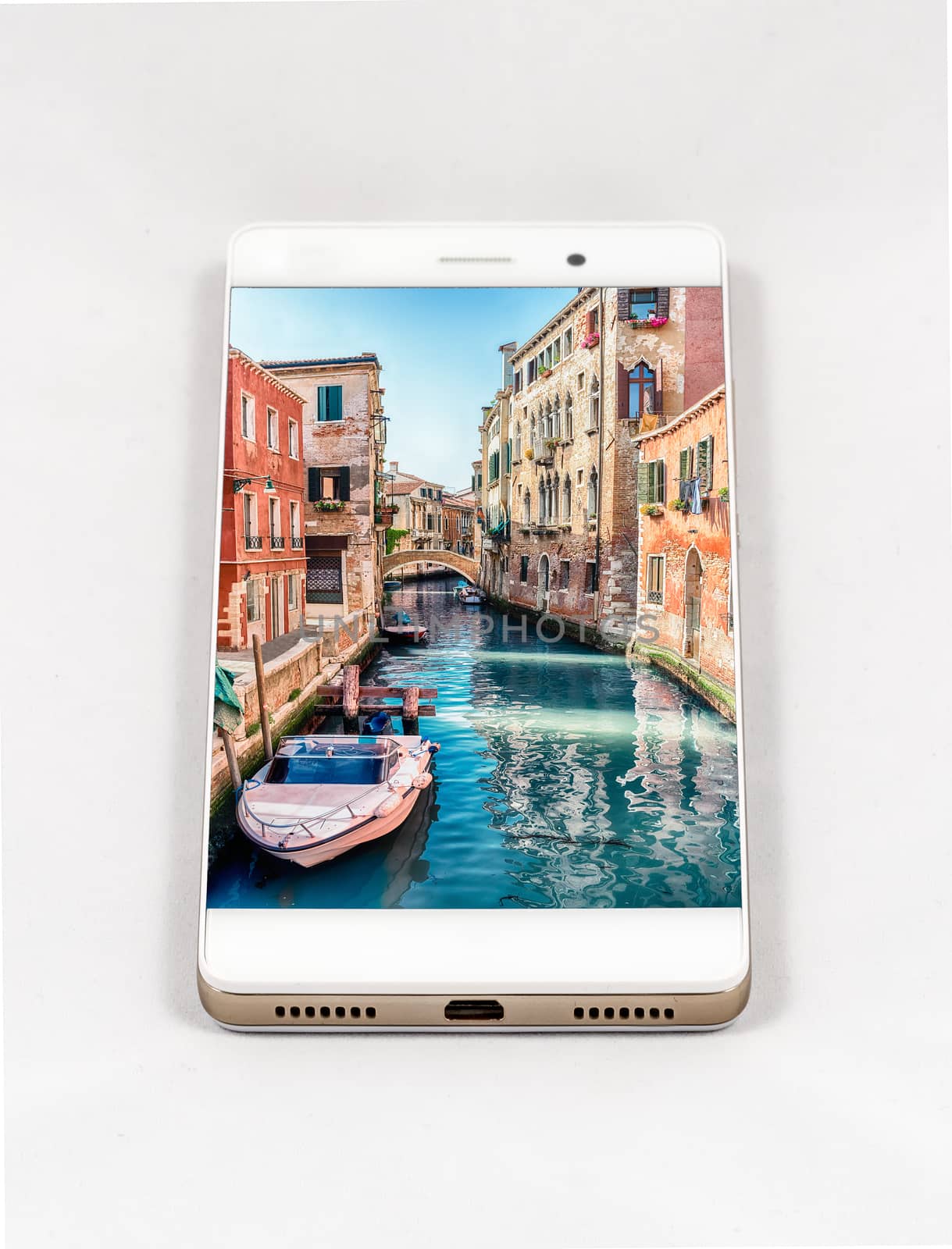 Modern smartphone with full screen picture of Venice, Italy. Concept for travel smartphone photography. All images in this composition are made by me and separately available on my portfolio