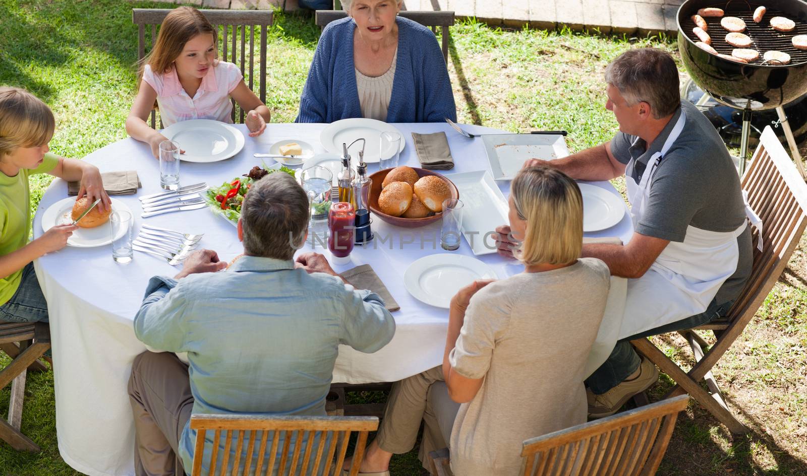 Family eating in the garden