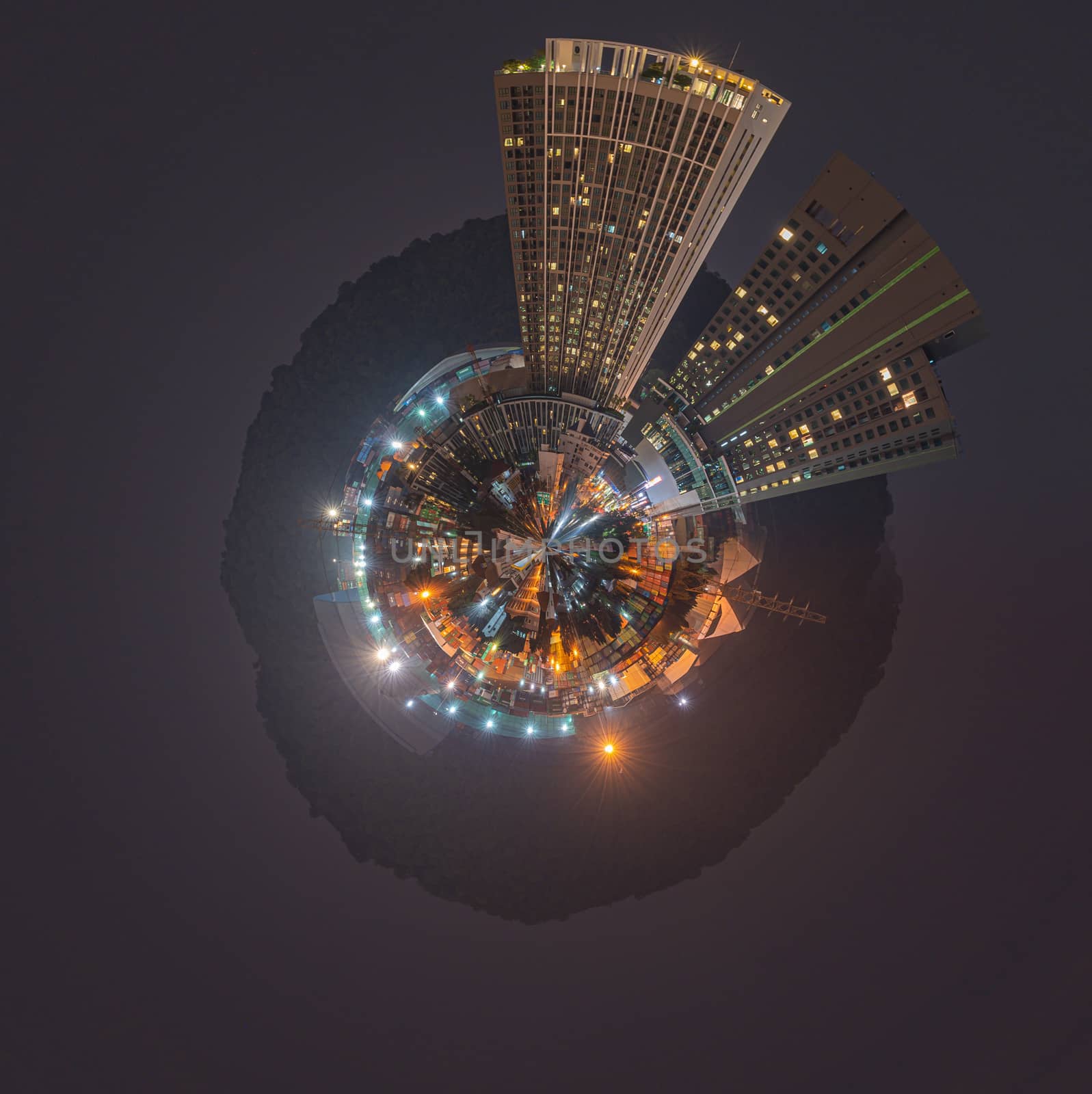 Aerial 360 degrees Panorama of aerial view of small city concept at night by peerapixs