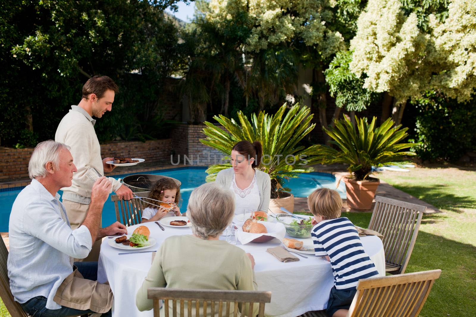 Family eating in the garden