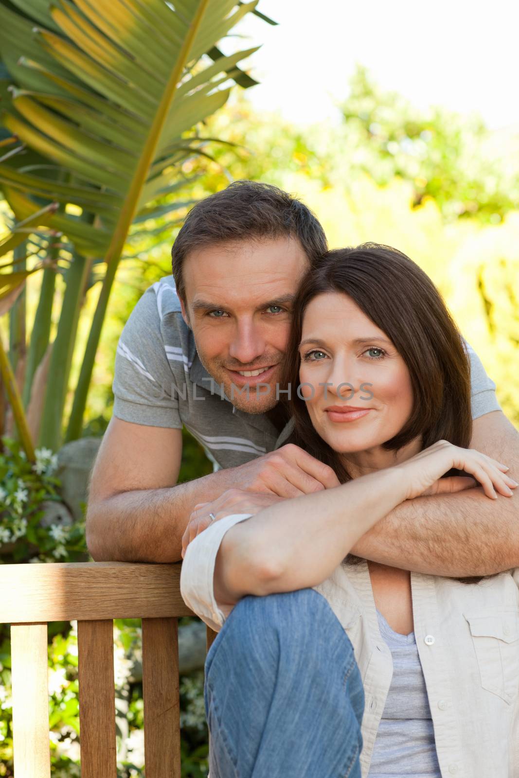 Joyful couple hugging in the garden by Wavebreakmedia