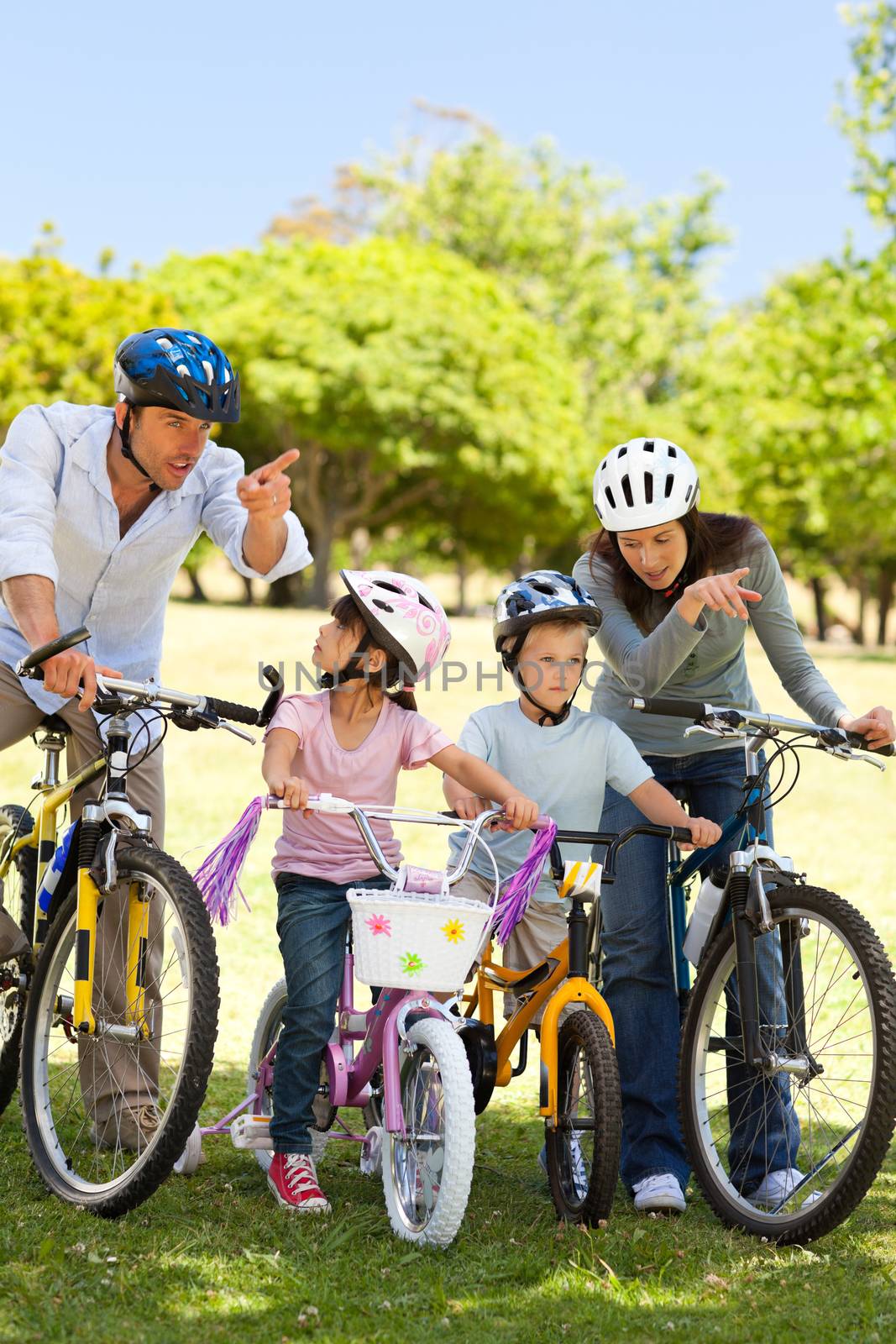 Family with their bikes by Wavebreakmedia