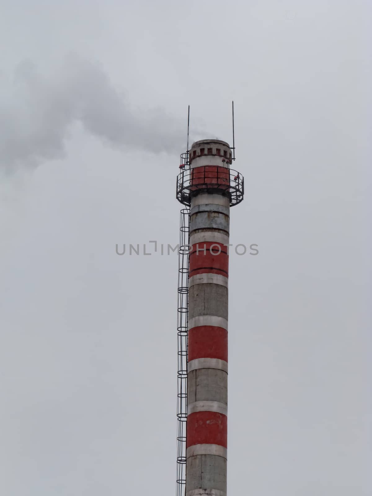 Smoke from factory tube on blue sky by bonilook