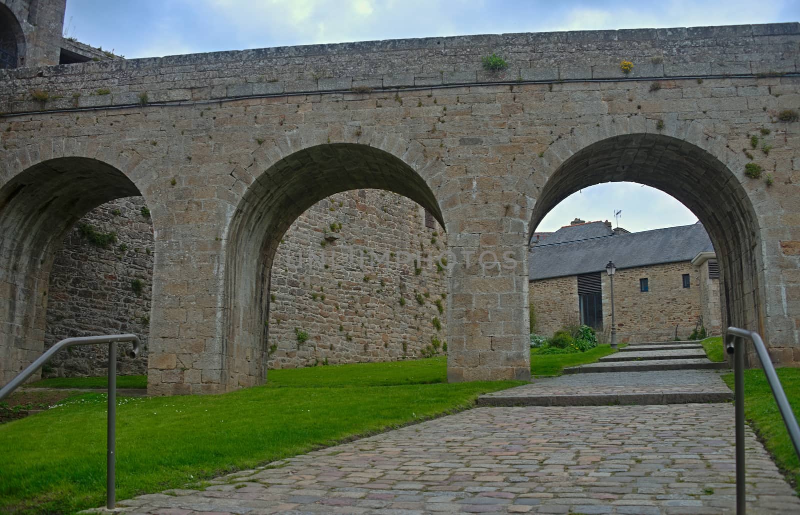 Big stone walls, gate and bridge at Dinan fortress, France by sheriffkule
