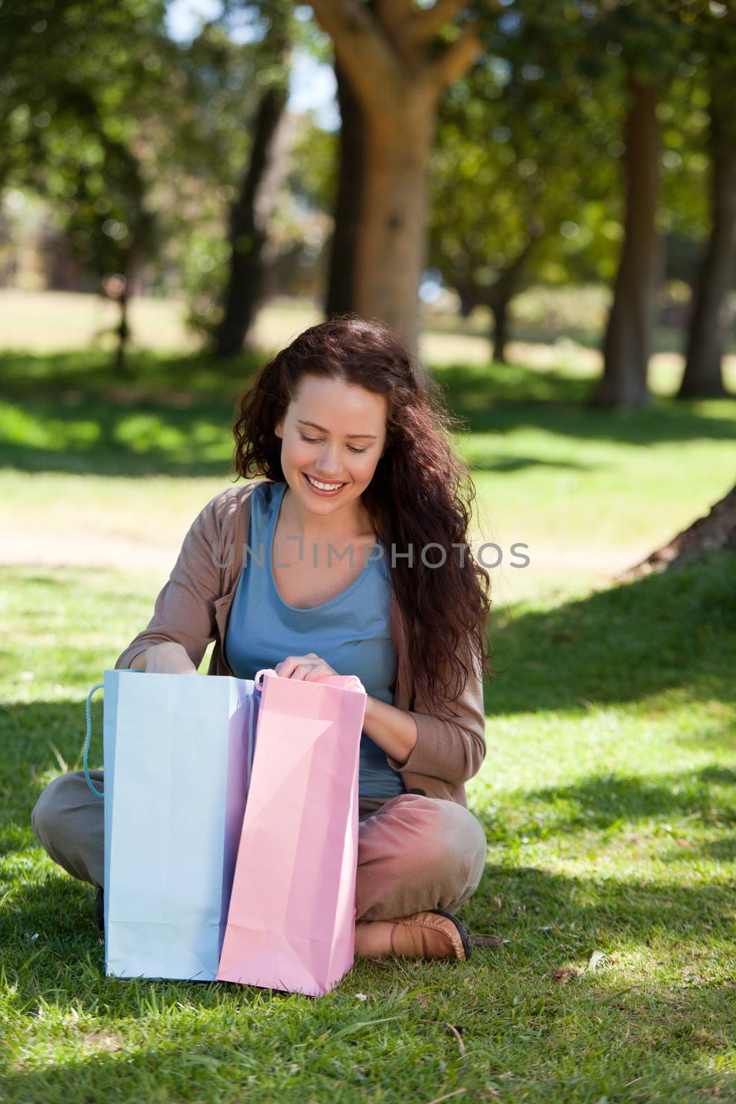 Beautiful woman with her shopping bag by Wavebreakmedia